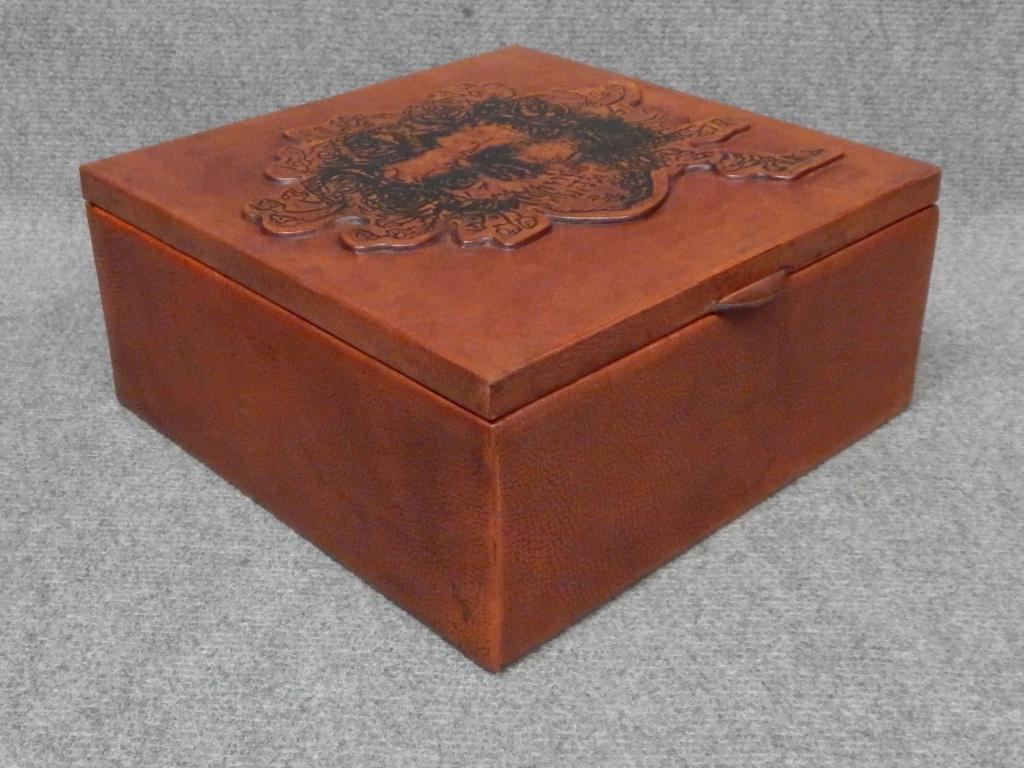 leather box skull with roses in high relief
